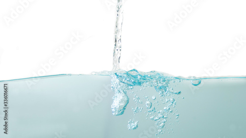 Water splash and ripple bubbles over white background
