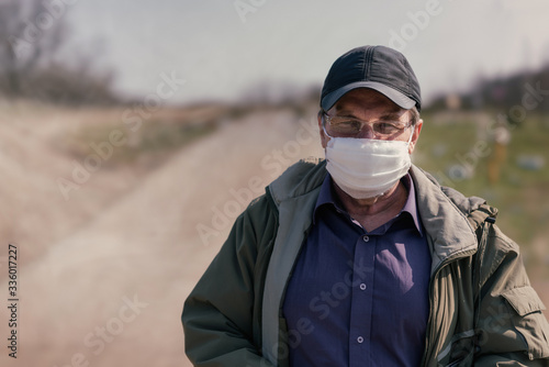 Sixty year old man in quarantine medical mask