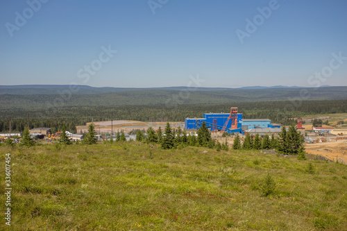 Mining site with mine headframe landscape view