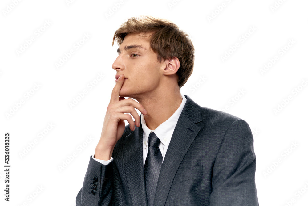 portrait of a young businessman thinking portrait of a young businessman thinking