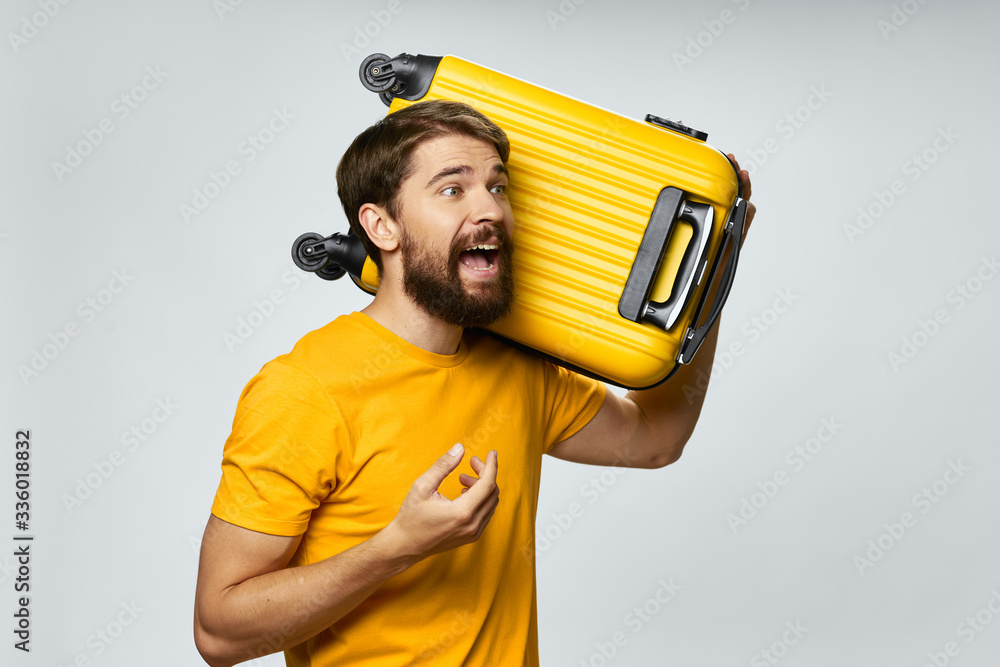 Cheerful man on with a suitcase Cheerful man on with a suitcase