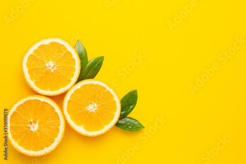 Tropical cutting citrus lemon on yellow background with copyspace