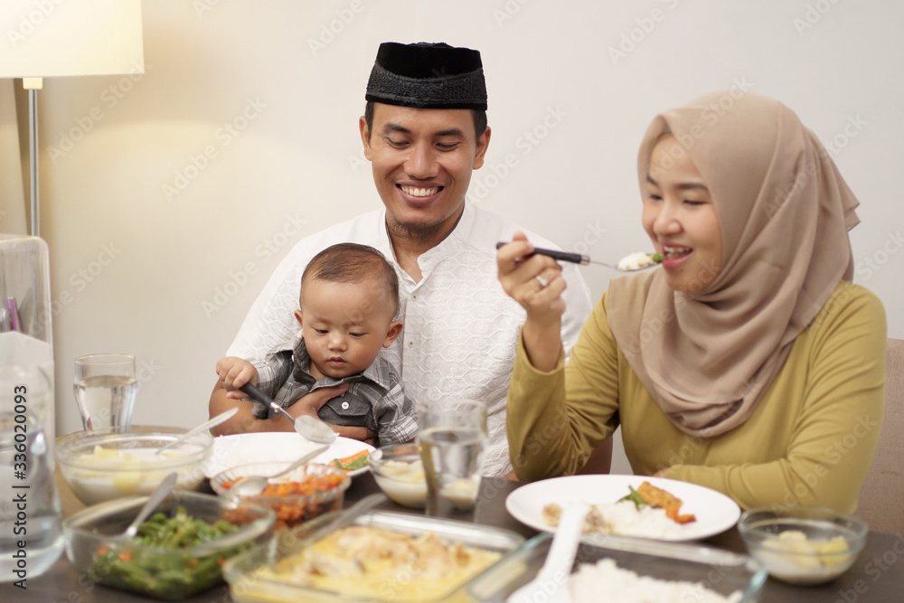 family having early breakfast before dawn. sahoor or sahur on ramadan family having early breakfast before dawn. sahoor or sahur on ramadan
