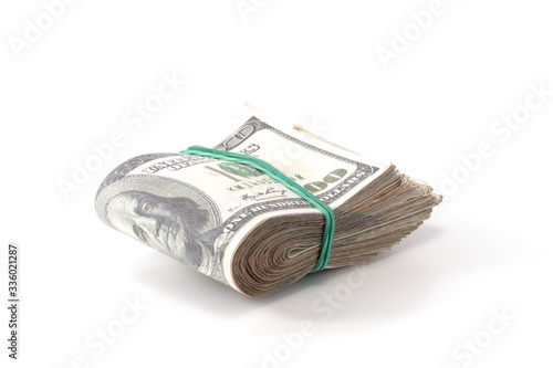 folded wad of money isolated