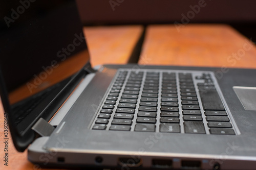 Close up macro of laptop keyboard and screen photo
