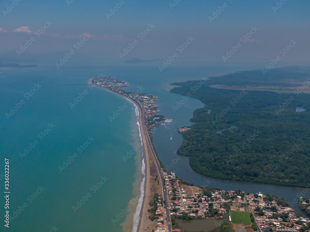 Fototapeta premium Beautiful aerial view of the city of Puntarenas and the Paseo de los turistas at the sunset in Costa Rica