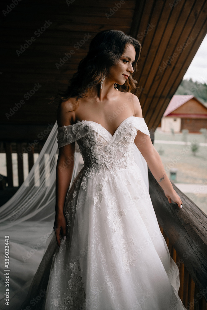 morning of the bride. bride on the balcony in the morning morning of the bride. bride on the balcony in the morning