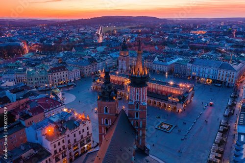 Krakow main square and st Mary basilica at dusk aerial drone view