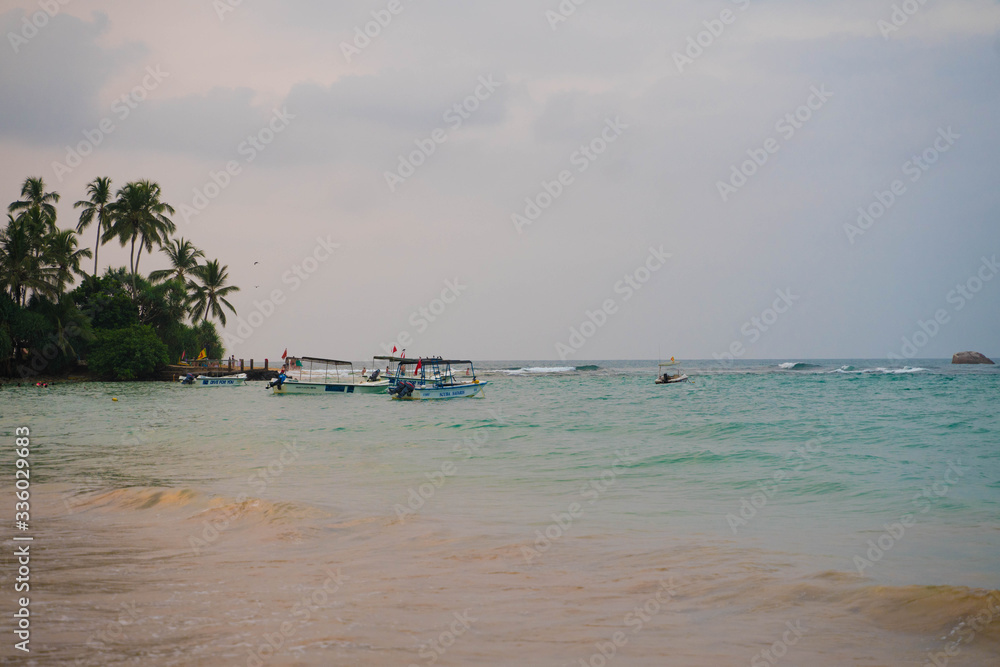 indian ocean with sri lanka coastal sand