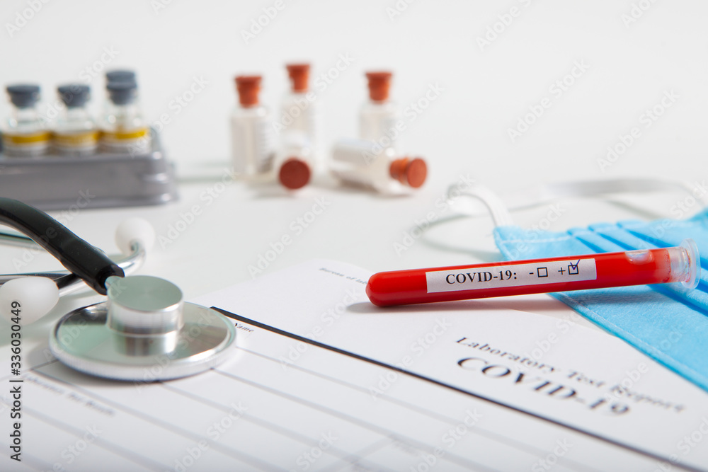 World coronavirus epidemic concept. Pandemic COVID-19, 2019-nKoV. Coronavirus vaccine testing. Positive analysis and laboratory blood sample. Test tube, vaccine, mask. World coronavirus epidemic concept. Pandemic COVID-19, 2019-nKoV. Coronavirus vaccine testing. Positive analysis and laboratory blood sample. Test tube, vaccine, mask.
