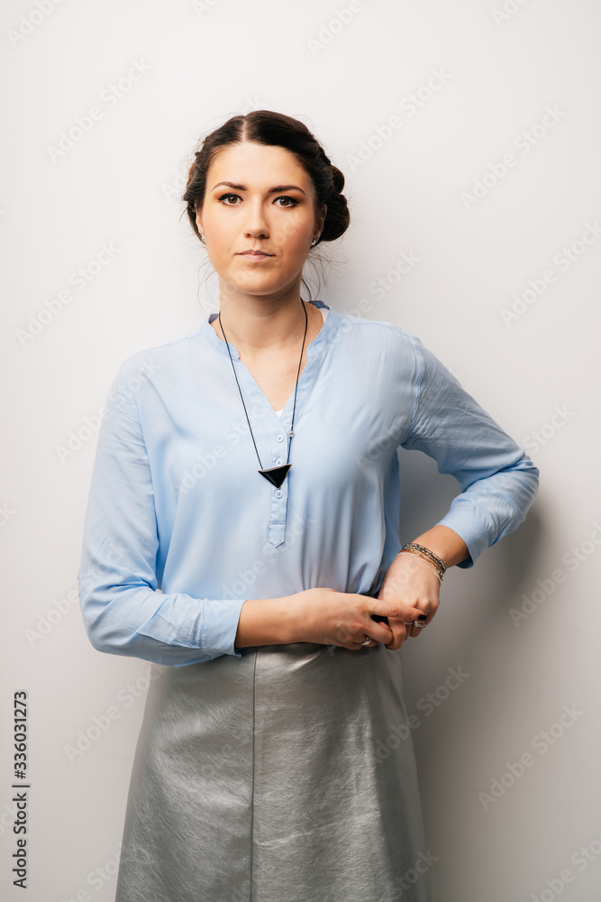 Pretty brunette girl angry hands on hips Pretty brunette girl angry hands on hips