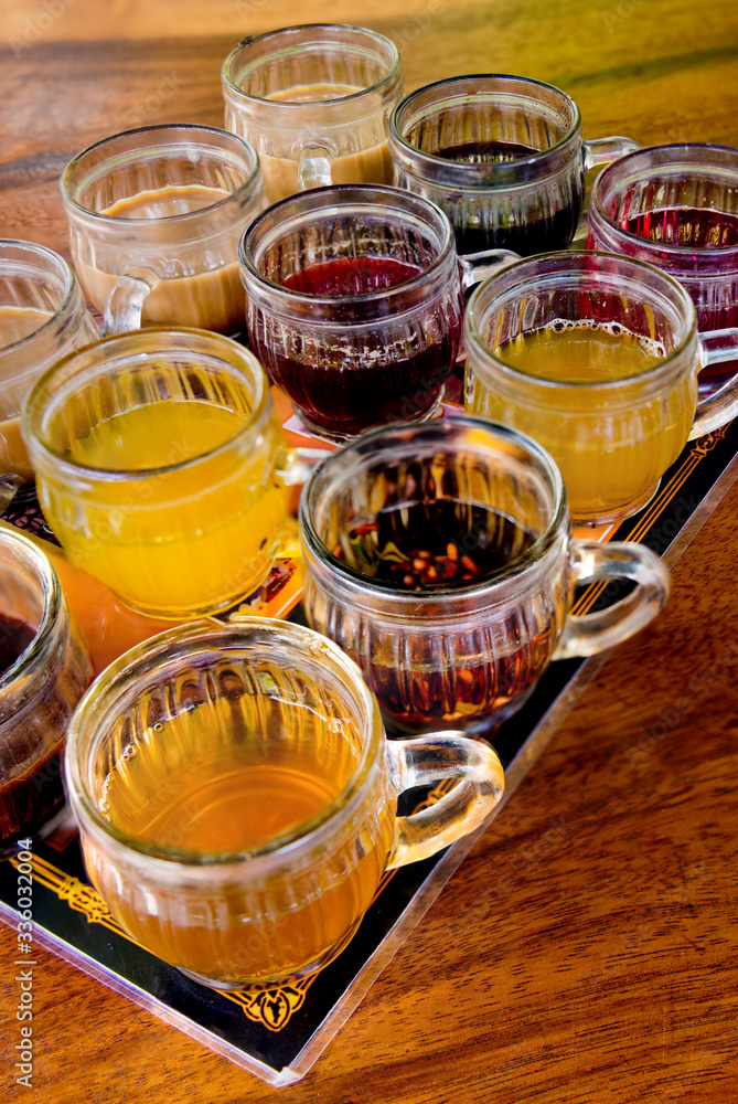 Closeup of Bali coffee, luwak coffee, fruit and herb tea testing set. Bali, Indonesia. Closeup of Bali coffee, luwak coffee, fruit and herb tea testing set. Bali, Indonesia.