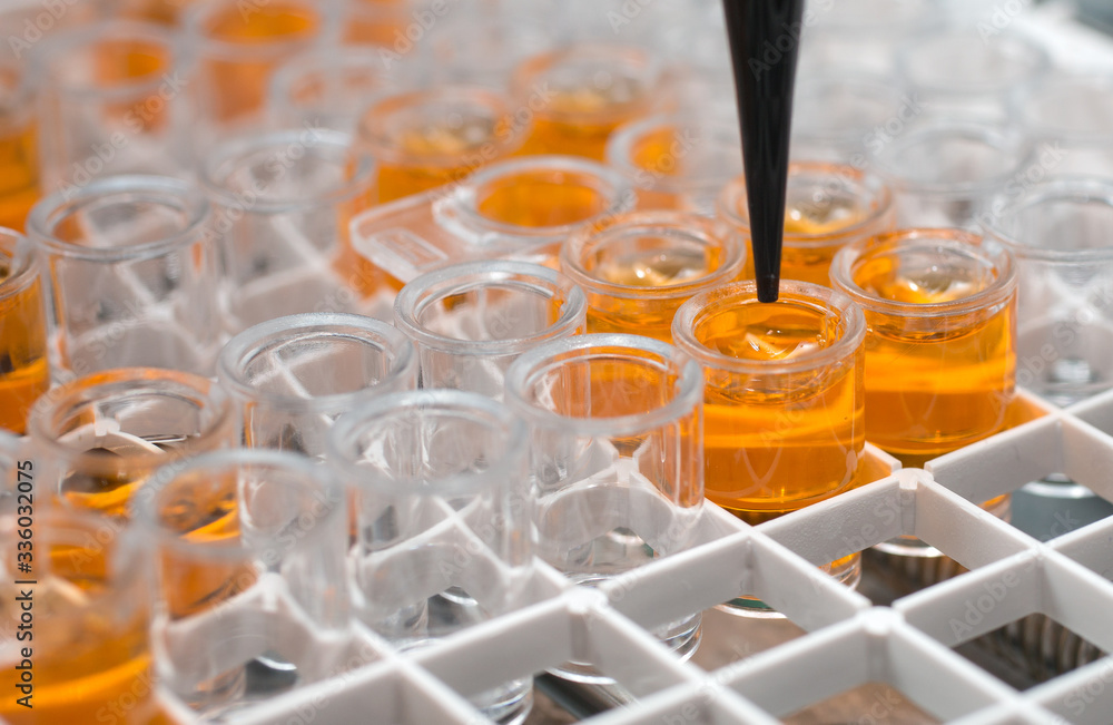 Φωτογραφία laboratory test tubes with liquid