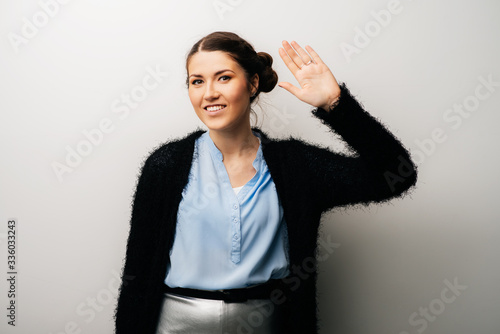 girl showing hello photo