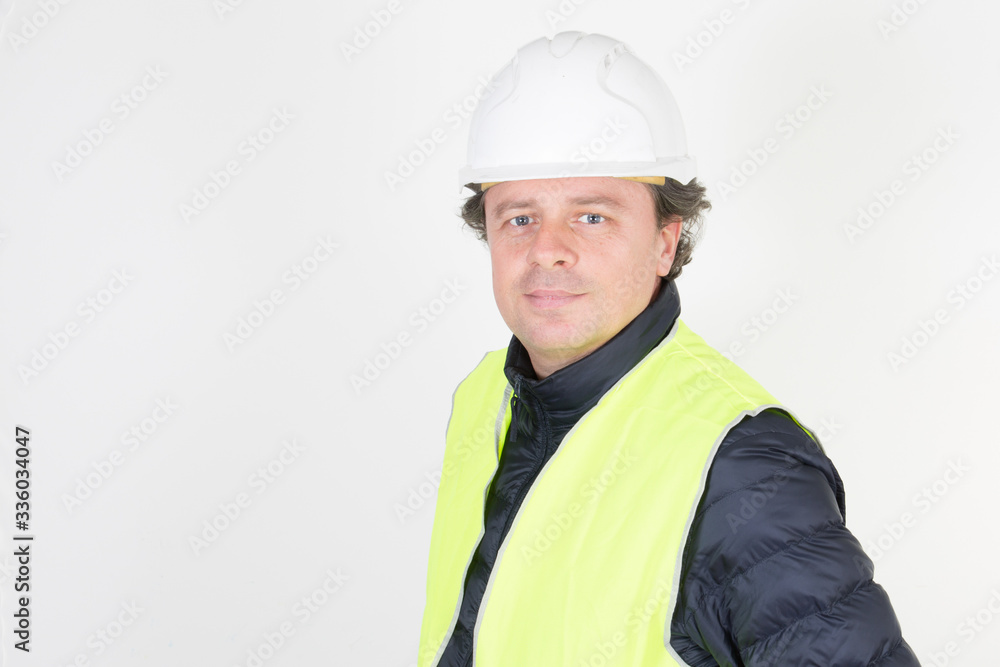 Man protective hard hat and uniform worker guy builder confident looking camera in protective equipment in white background Man protective hard hat and uniform worker guy builder confident looking camera in protective equipment in white background