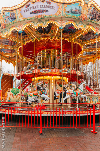 Large European carousel with horses
