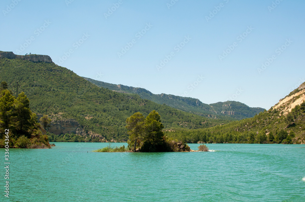Natural lake with mountains in Cofrentes (Spain) Natural lake with mountains in Cofrentes (Spain)