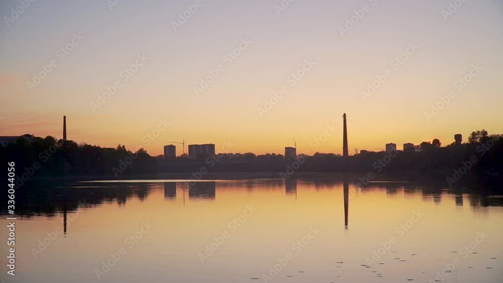 landscape of the city and lake in the sunset landscape of the city and lake in the sunset