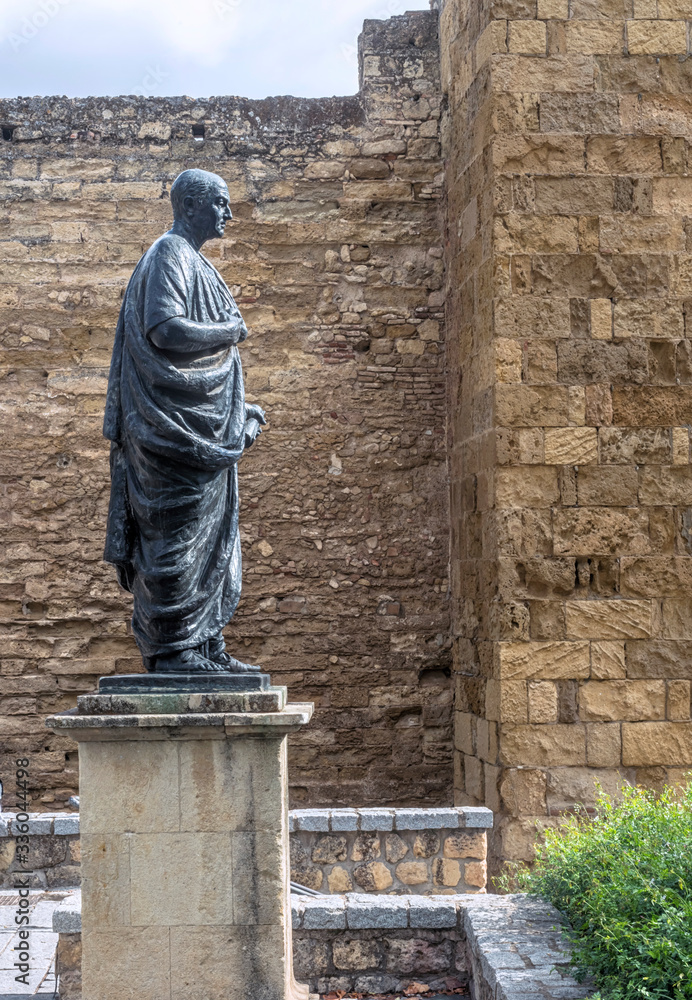 Naklejka premium Statue of Lucio Anneo Seneca near the Puerta de Almodovar, Cordoba, Andalucia, Spain