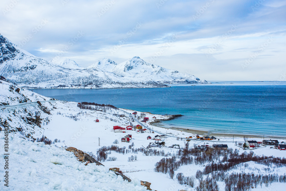 Grøtfjorden is a village located north-west of Tromsø. There is beautiful little fjord and small beach, that gets very crowded in the summer but becomes desolated and very quiet in the winter.