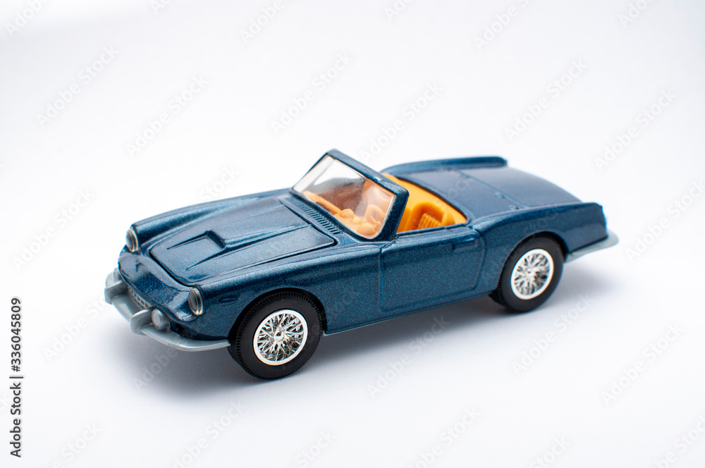 Blue toy car on white background