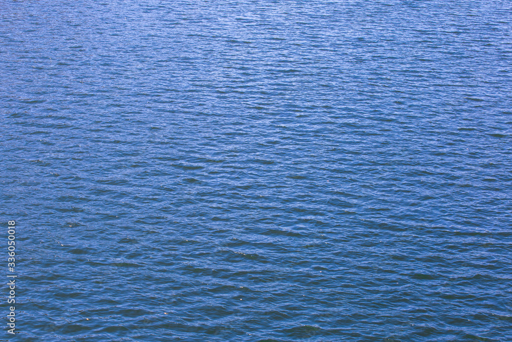 texture of blue sea water surface background texture of blue sea water surface background