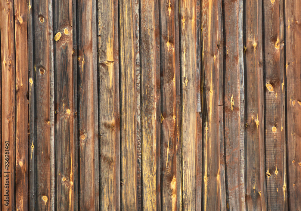 Fototapeta premium Brown vintage wooden knotty boards background.