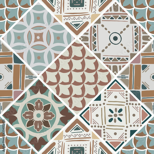 Colorful floral seamless hand drawn ornamental east pattern in patchwork boho chic style from rhomb, in portuguese and moroccan motif