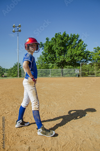 Photography Male youth baseball player standing on the field
