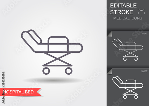 Hospital bed. Line icon with editable stroke. Vector illustration
