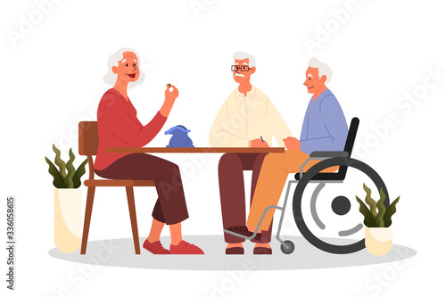 Happy elderly playing bingo together. Old man and woman playing