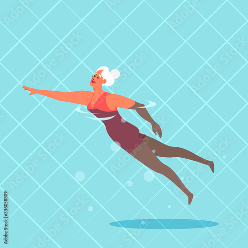 Old woman in swimming pool. Elderly character have an active