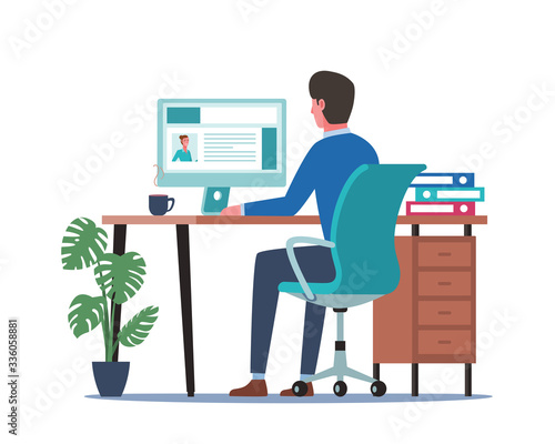 Young man working on computer. Business people sitting at office desk. Flat design vector illustration © bonezboyz
