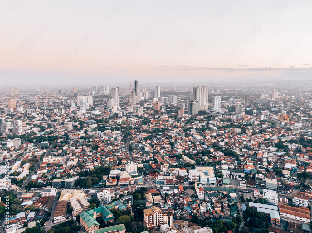 Aerial Cityscape of Metro Manila while sunrise