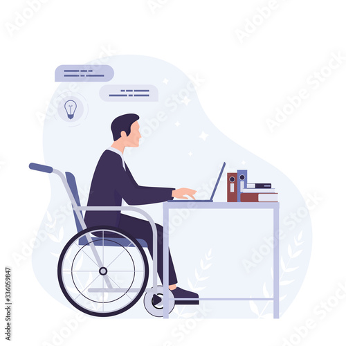 Disabled young man in wheelchair working in office. Happy man with