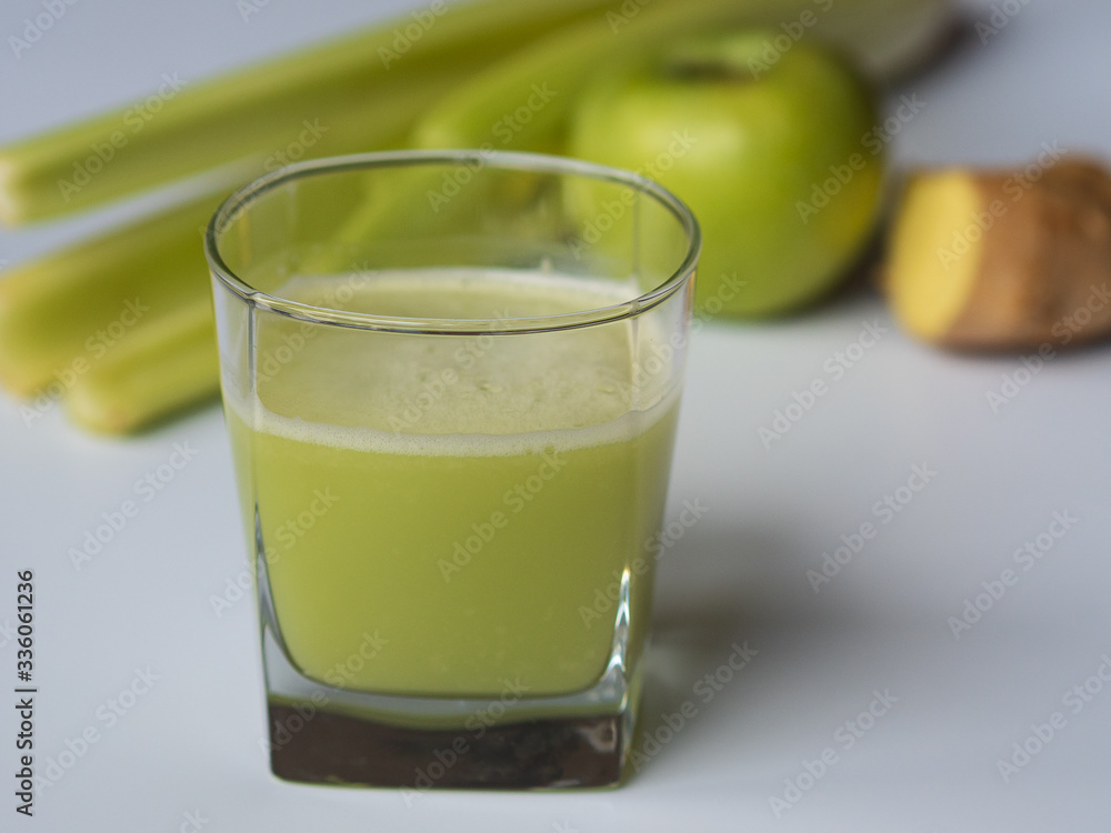 Juice from green apple, celery, and ginger. Fruit and vegetable juices. Healthy lifestyle. Immunity support. Juice from green apple, celery, and ginger. Fruit and vegetable juices. Healthy lifestyle. Immunity support.