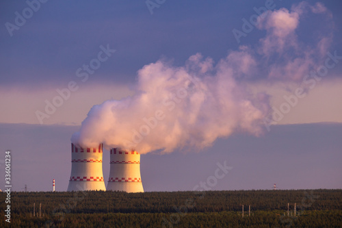 Cooling towers of a nuclear power plant in the light of the sun