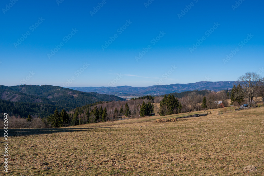 Obraz premium Meadow in mountains in early spring, Beskydy Mountains czech