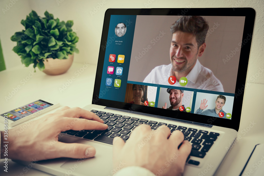 laptop on tabletop video conference laptop on tabletop video conference