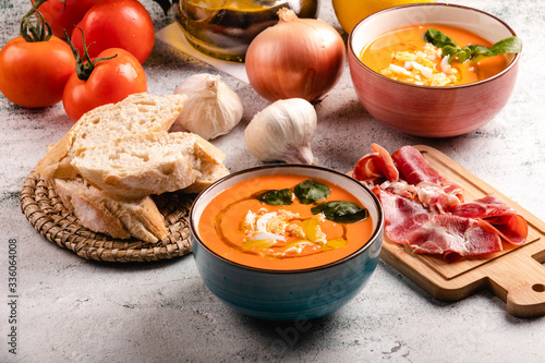 Fototapeta Naklejka Na Ścianę i Meble -  Salmorejo Soup With Ham And Eggs In A Bowl