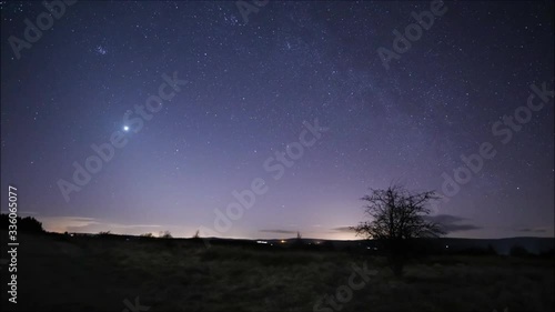 Night sky time lapse of zodiacal light, planet venus and milky way from beaghmore stone circles in N. Ireland photo