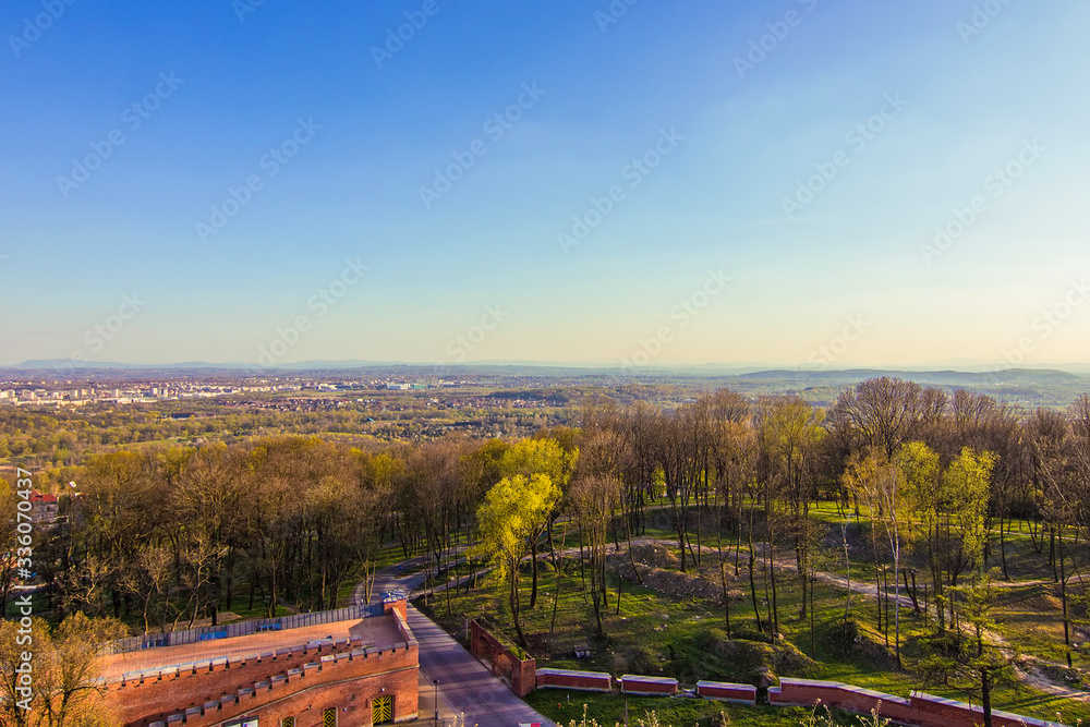 Beautiful view from the Tadeusz Kosciuszko mound in Krakow, Poland. Selective focus.
Kosciuszko mound is city landmark from 1823, dedicated to Polish and American military hero Tadeusz Kosciuszko