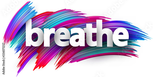 Small letters breathe sign on brush strokes background.