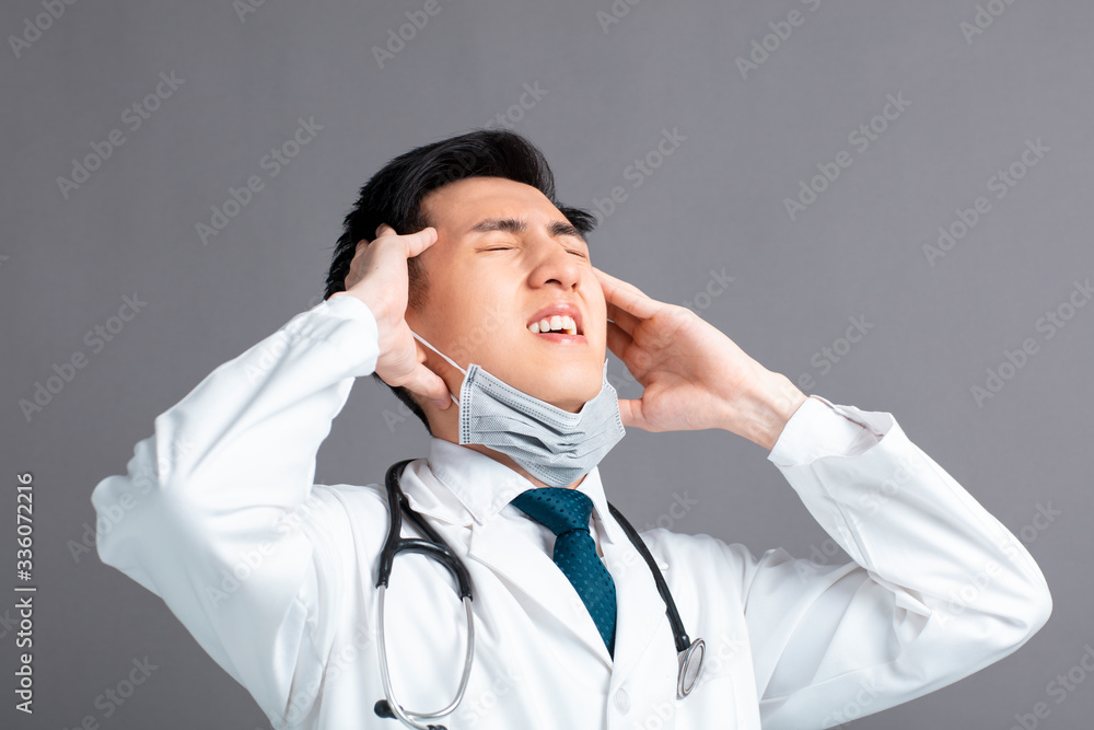 stress and tired young Doctor Wear Medical Mask stress and tired young Doctor Wear Medical Mask