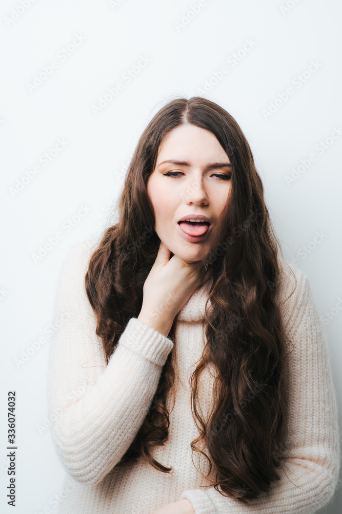 on a white background a young girl with long hair sore throat on a white background a young girl with long hair sore throat
