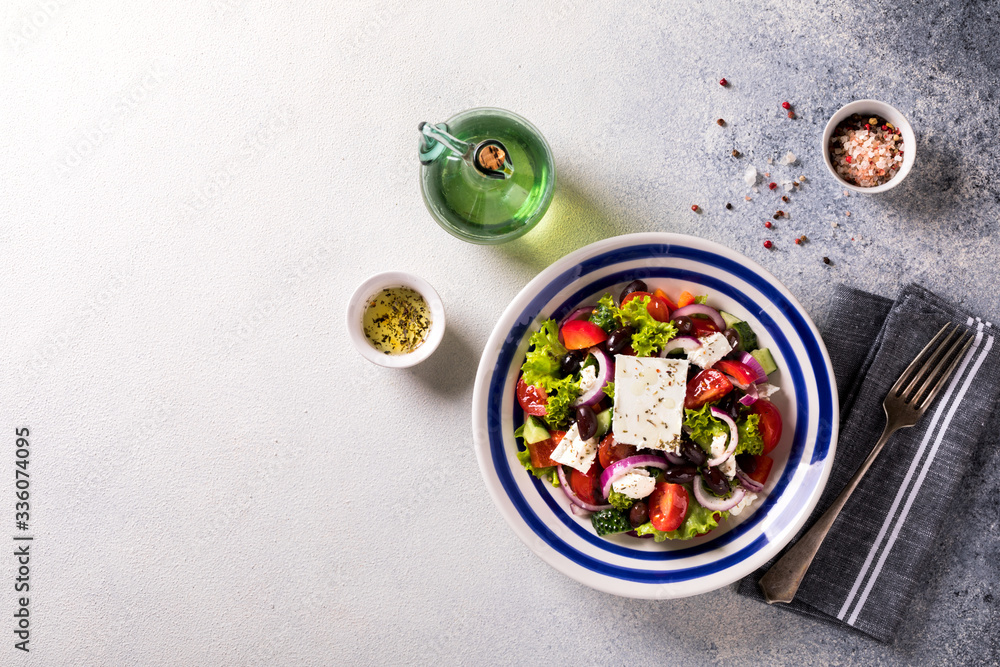 Greek salad of fresh vegetables, olives and feta. Traditional Mediterranean food. Greek salad of fresh vegetables, olives and feta. Traditional Mediterranean food.