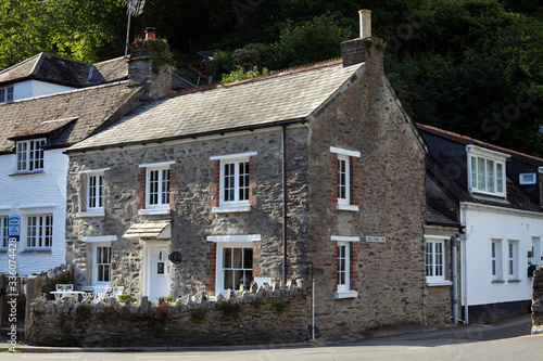 Polperro (England), UK - August 16, 2015: Tipycal house in Polperro village, Cornwall, England, United Kingdom.