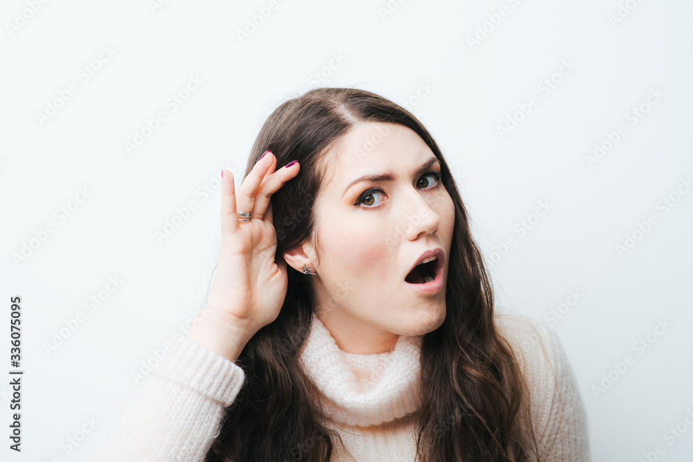 beautiful long-haired girl overhears on a white background beautiful long-haired girl overhears on a white background