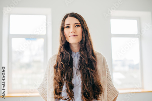 on a white background young girl with long hair