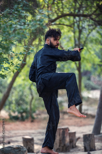 Kung fu in chinese style on landspace background. Chinese martial arts.
